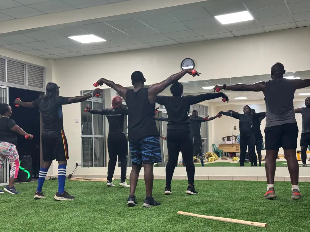 A Vitality group class mid-session on the green turf studio floor
